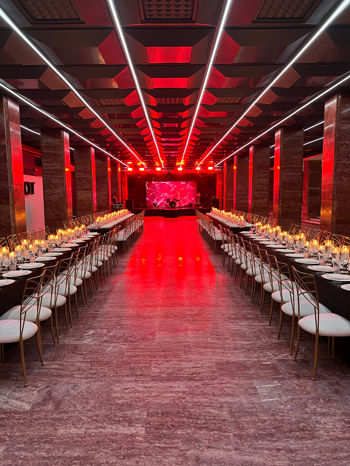10th ACCF Congress official dinner at Noar Hall — long banquet tables under red ceiling lights